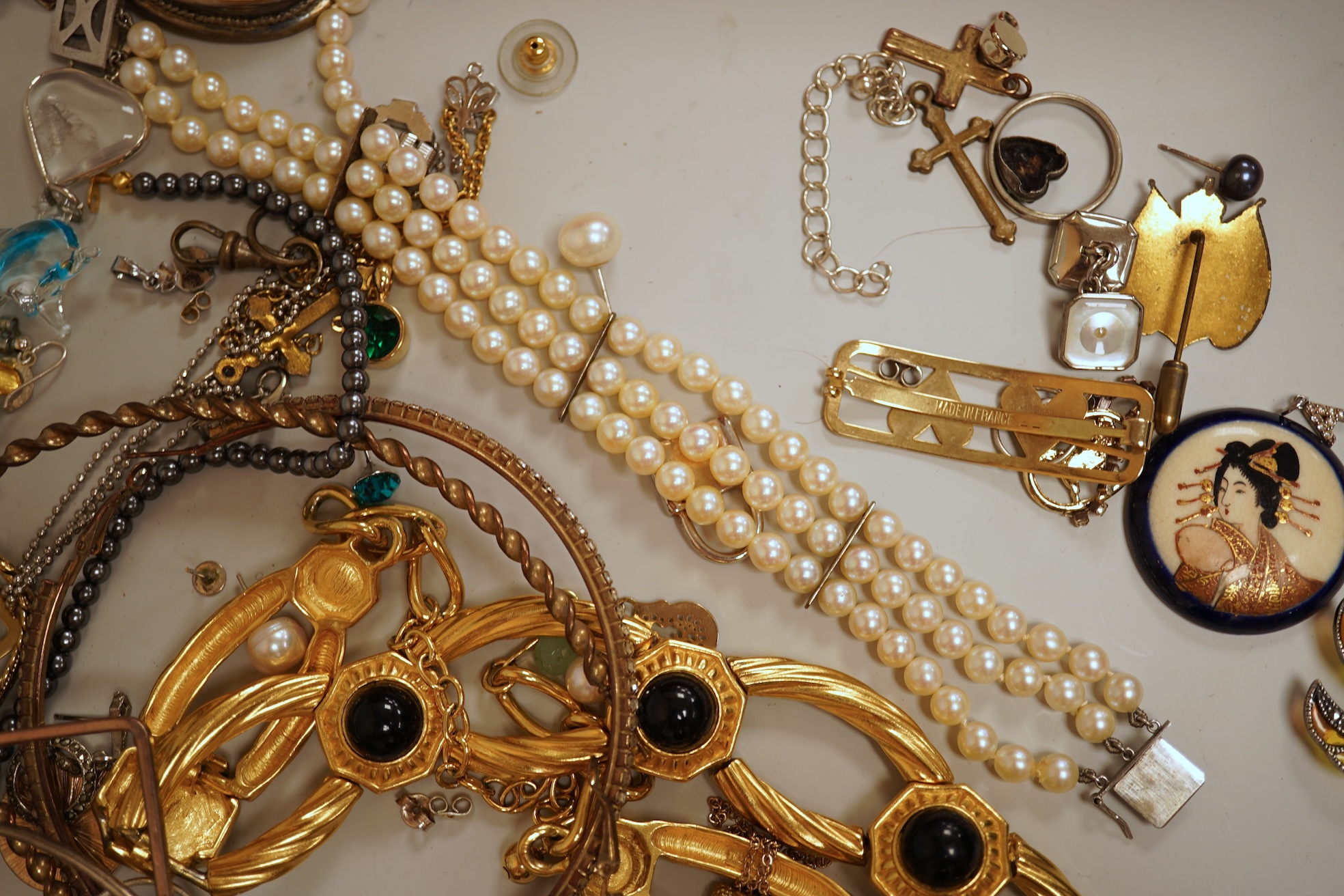 A small collection of assorted costume jewellery and other items including a cut steel shoe buckle, bracelets, chains, pair of silver and enamel oval cufflinks, etc.